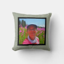 Search for teal grey and white cushions Initial