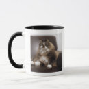 Search for sitting cat mugs Looking at camera
