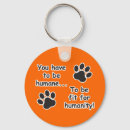 Search for abusive rounded key rings Dogs