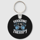 Search for combat sport round key rings Combat sparring session