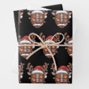 Search for football xmas wrapping paper Santa