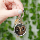 Search for embossed small key rings Relief