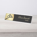 Search for black and gold name plates Real estate