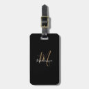 Search for gold luggage tags Black
