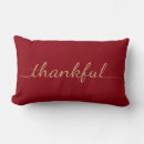 Search for burgundy and tan cushions Brown