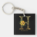Search for gold letter key rings Couple