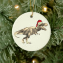 Search for dinosaur with santa christmas tree decorations Boy