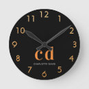 Search for black and gold clocks Unique