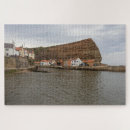 Search for charmed puzzles Picturesque