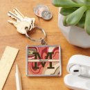 Search for cream key rings Initial