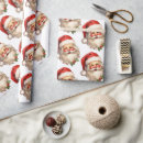Search for claus wrapping paper Christmas tree