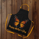 Search for butterfly on black aprons For her