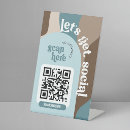 Search for social media qr code signs Follow me