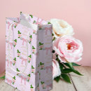 Search for purple and gold gift bags Girl