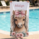 Search for horse on beach towels Girl