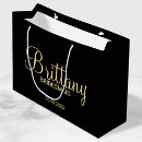 Search for black and gold gift bags Script
