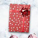 Search for christmas star wrapping paper Red background