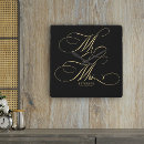 Search for black and gold clocks Script