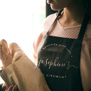 Search for black calligraphy aprons Modern