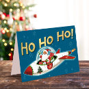 Search for rocket christmas cards Santa