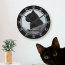 Search for paw print clocks Cat