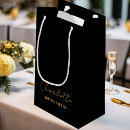 Search for black and gold gift bags Girly