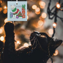 Search for ugly christmas tree decorations Cat