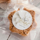 Search for ivory and gold stickers Script