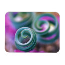Search for curled magnets Abstract