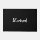Search for black and white doormats Text
