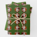 Search for happy holidays wrapping paper Santa claus