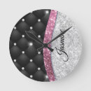 Search for silver and pink clocks For her