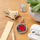 Search for red and silver rounded key rings Floral