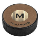 Search for gold hockey pucks Initial