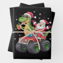 Search for dino christmas wrapping paper Santa