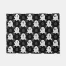 Search for funny halloween doormats Black and white
