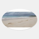 Search for footprints in the sand stickers Sea