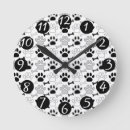 Search for paw print clocks Black and white