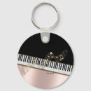 Search for gold music note key rings Musician