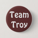 Search for trois badges Troy