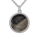 Search for music necklaces piano