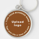 Search for advertisement round key rings Logo