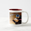 Search for cat playing mugs Poker