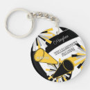 Search for gold color key rings For her