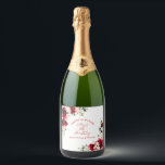 18th Birthday Party Red Pink Floral Custom Sparkling Wine Label<br><div class="desc">Pretty red roses and blush pink peonies decorate this 18th birthday party custom wine label. Two lovely floral arrangements decorate two corners. A vintage font proclaims Cheers to 18 Years! Elegant calligraphy spells out Happy 18th birthday, with birthday celebrant's name is below. This item is part of the Red Rose...</div>