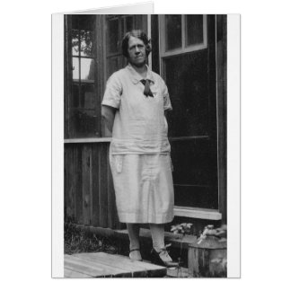 1920's Lady standing outside of building