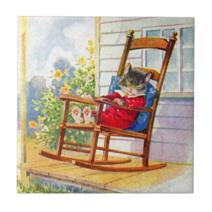 1930s adorable kitten napping on porch rocker tile