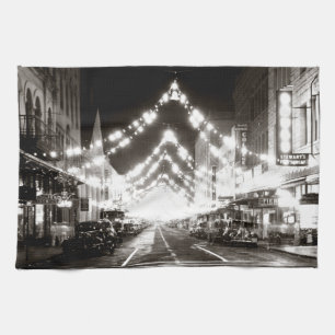 1942 Honolulu's Fort Street at Night Tea Towel