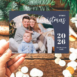 1 photo Christmas arch modern minimalist blue Holiday Card<br><div class="desc">This elegant and modern Christmas greeting card features a minimalist design displaying 1 of your favourite family pictures inside a trendy arch frame. Easily customisable with your family name and the current year in stylish serif fonts over a classic blue background.</div>