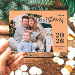 1 photo Christmas arch modern minimalist orange Holiday Card<br><div class="desc">This elegant and modern Christmas greeting card features a minimalist design displaying 1 of your favourite family pictures inside a trendy arch frame. Easily customisable with your family name and the current year in stylish serif fonts over a modern light orange shade background.</div>